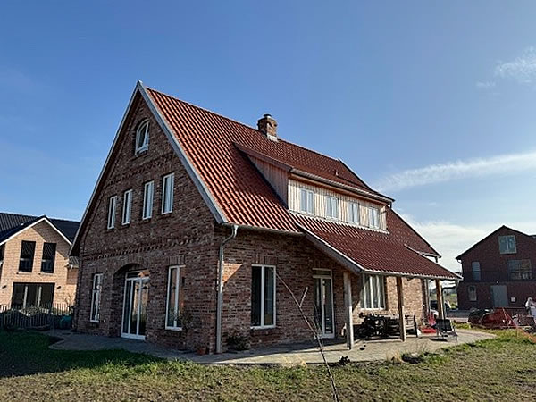 Bewertung Hausbau englisches Cottage in der Region Hannover - Bauunternehmen Alan Berry aus Celle, ihr Maurer für englische Cottages und Landhäuser in Celle. Nachhaltiger Hausbau mit historischen Baustoffen. Bewertung Hausbau englisches Cottage in der Region Hannover - Englische Cottages aus Celle - Bauunternehmen Alan Berry